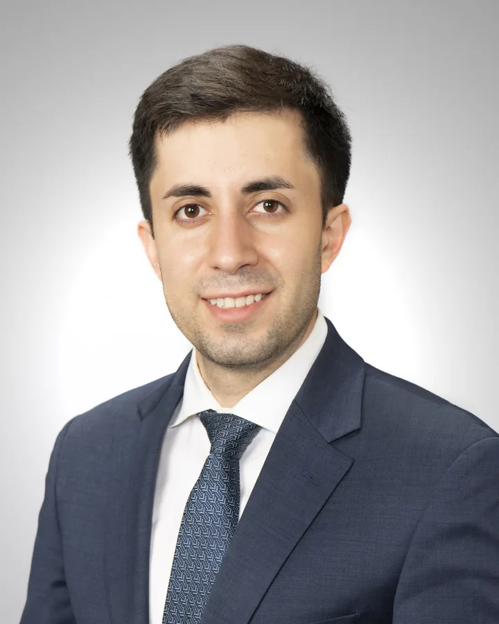Portrait of Dr. Hasan Khosravi, board-certified dermatologist at AXIS Dermatology